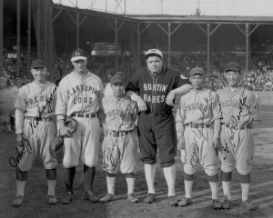 Baseball greats Lou Gehrig, second from left, and Babe Ruth, fourth from left, join Japanese American players at an exhibition in 1927.  